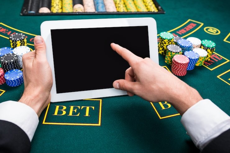 Antarmuka aplikasi kikototo menampilkan pasar olahraga dan permainan live dealer
